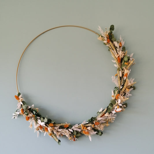 Couronne murale en métal doré